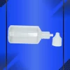 Gotero de 40 ml color natural con tapa blanca acostado en fondo azul